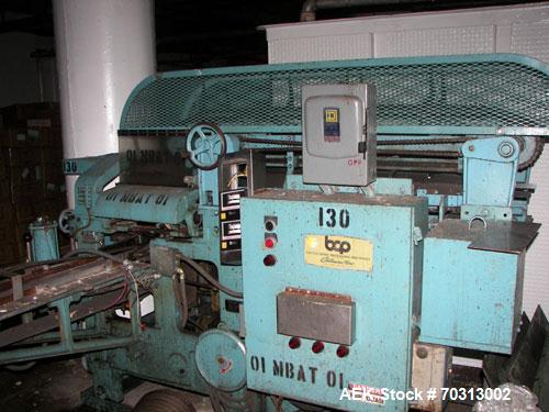 Used Battle Creek Model Overwrapper Horizontal Flow Wrapper. Last used on cartons of candy. Has overhead lug chain pull through conveyor.