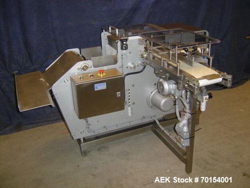 Used Benhill Butter Packing/Wrapping Machine, model 8311S. Reconditioned automatic filling/wrapping machine for butter or margarine with new electrical panel with frequency control, 100% mechanical d...