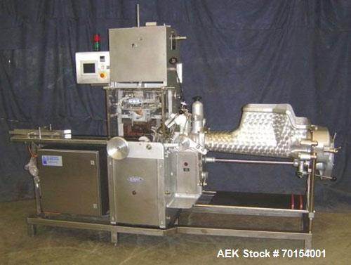 Used Benhill Butter Packing/Wrapping Machine, model 8311S. Reconditioned automatic filling/wrapping machine for butter or margarine with new electrical panel with frequency control, 100% mechanical d...