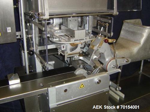 Used Benhill Butter Packing/Wrapping Machine, model 8311S. Reconditioned automatic filling/wrapping machine for butter or margarine with new electrical panel with frequency control, 100% mechanical d...