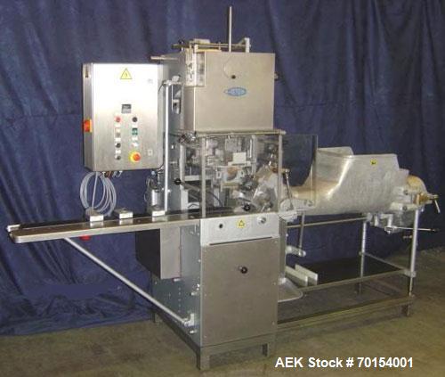Used Benhill Butter Packing/Wrapping Machine, model 8311S. Reconditioned automatic filling/wrapping machine for butter or margarine with new electrical panel with frequency control, 100% mechanical d...
