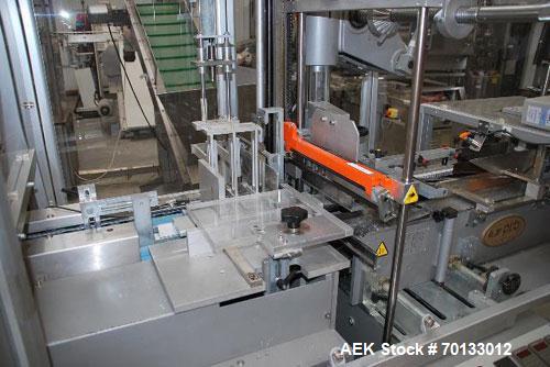 Used-PRB Automatic Overwrapper, Model FAR 2001, capacity 80 packs/minute.  Equipped with 4' x 4" (1200 x 100 mm) dual side P...