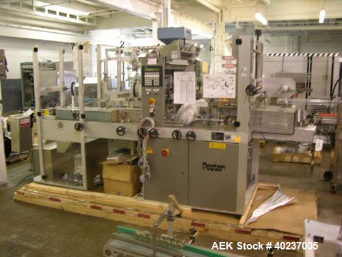 Used Pester Overwrapper, type PEWO-FOLD 1. 450mm max film width, 60mm x 60mm x 20mm min format, 400mm x 350mm x 140mm max format, rated up to 60 cycles/minute, 480 volt, serial #4452, new 1999.