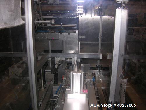Used Pester Overwrapper, type PEWO-FOLD 1. 450mm max film width, 60mm x 60mm x 20mm min format, 400mm x 350mm x 140mm max format, rated up to 60 cycles/minute, 480 volt, serial #4452, new 1999.