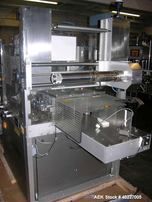 Used Pester Overwrapper, type PEWO-FOLD 1. 450mm max film width, 60mm x 60mm x 20mm min format, 400mm x 350mm x 140mm max format, rated up to 60 cycles/minute, 480 volt, serial #4452, new 1999.
