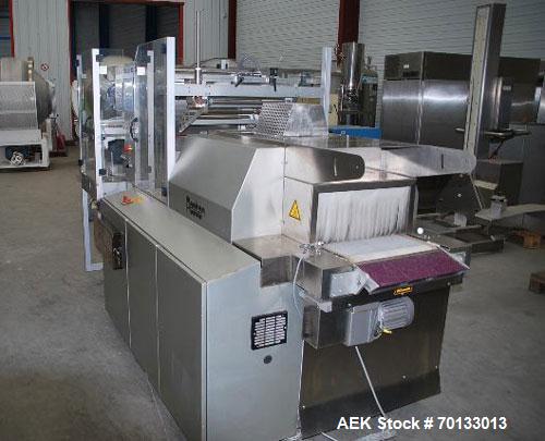 Used Pester Overwrapper wth heat tunnel, model Pewo-Pack-450. Output capacity is approximately 12 packs/minute. PE film width 17.7" (450 mm), maximum pack length 7.9" (200 mm), width 15.8" (400 mm), ...