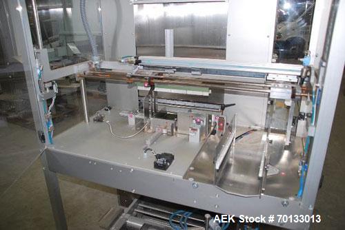 Used Pester Overwrapper wth heat tunnel, model Pewo-Pack-450. Output capacity is approximately 12 packs/minute. PE film width 17.7" (450 mm), maximum pack length 7.9" (200 mm), width 15.8" (400 mm), ...
