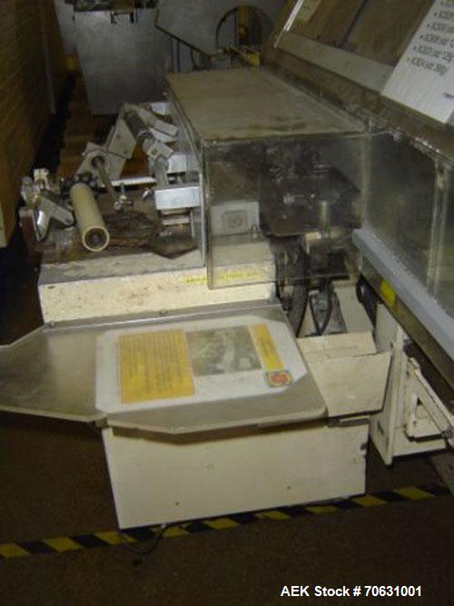 Used Sapal SC3-100 Foil and Bank Wrapper.  300 Wraps/min maximum depending on size and type of bar.  Current set up 125 grams chocolate bars.  6.4" x 3.3" x 0.4" (163 x 85 x 10 mm).  Including PEC an...