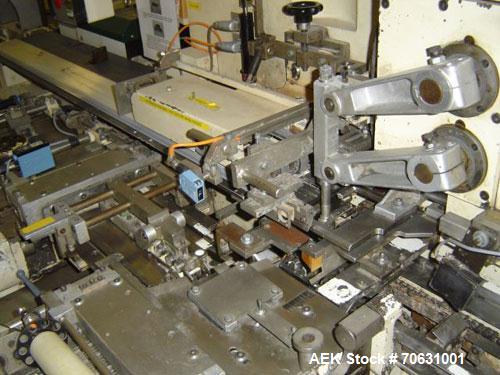 Used-Sapal SC3-100 Foil and Bank Wrapper.  300 Wraps/min maximum depending on size and type of bar.  Current set up 125 gram...