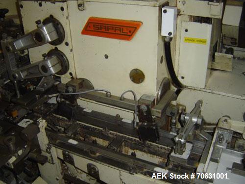 Used Sapal SC3-100 Foil and Bank Wrapper.  300 Wraps/min maximum depending on size and type of bar.  Current set up 125 grams chocolate bars.  6.4" x 3.3" x 0.4" (163 x 85 x 10 mm).  Including PEC an...