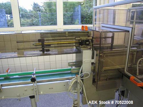 Used Sollas 17H125 Overwrapping Machine.  Used for all hot sealing oils, PP/PVC/PE/cellophane.  Formate area length 1.7" - 11.8" (45 - 300 mm), width 1.6" - 7.45" (40 - 190 mm), height 0.6 - 4.9" (16...
