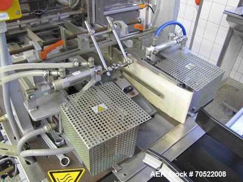 Used Sollas 17H125 Overwrapping Machine.  Used for all hot sealing oils, PP/PVC/PE/cellophane.  Formate area length 1.7" - 11.8" (45 - 300 mm), width 1.6" - 7.45" (40 - 190 mm), height 0.6 - 4.9" (16...