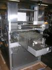 Used Pester Overwrapper, type PEWO-FOLD 1. 450mm max film width, 60mm x 60mm x 20mm min format, 400mm x 350mm x 140mm max format, rated up to 60 cycles/minute, 480 volt, serial #4452, new 1999.