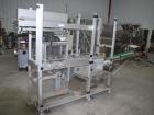 Used Pester Overwrapper wth heat tunnel, model Pewo-Pack-450. Output capacity is approximately 12 packs/minute. PE film width 17.7