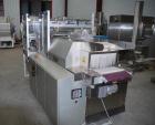 Used Pester Overwrapper wth heat tunnel, model Pewo-Pack-450. Output capacity is approximately 12 packs/minute. PE film width 17.7