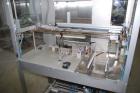 Used-Pester Overwrapper wth heat tunnel, model Pewo-Pack-450. Output capacity is approximately 12 packs/minute. PE film widt...