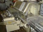 Used Sapal SC3-100 Foil and Bank Wrapper.  300 Wraps/min maximum depending on size and type of bar.  Current set up 125 grams chocolate bars.  6.4