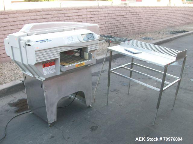 Used Mettler Toledo Wrapper, Model 645 XL-45, 90 degree conveyor, 3' accumulator table.