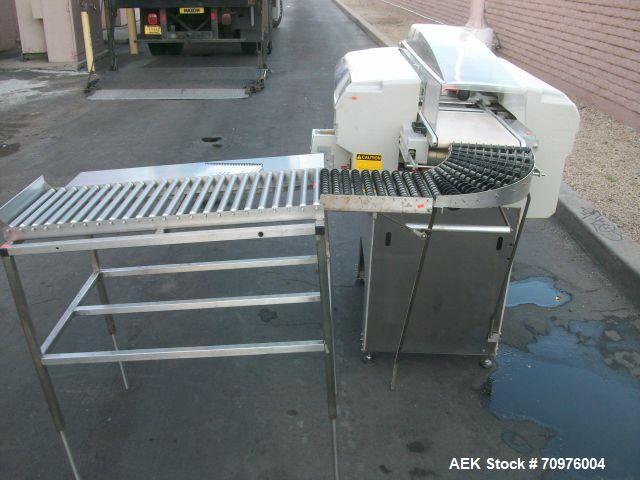 Used Mettler Toledo Wrapper, Model 645 XL-45, 90 degree conveyor, 3' accumulator table.