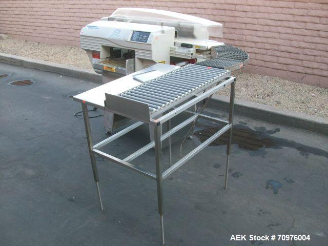 Used Mettler Toledo Wrapper, Model 645 XL-45, 90 degree conveyor, 3' accumulator table.