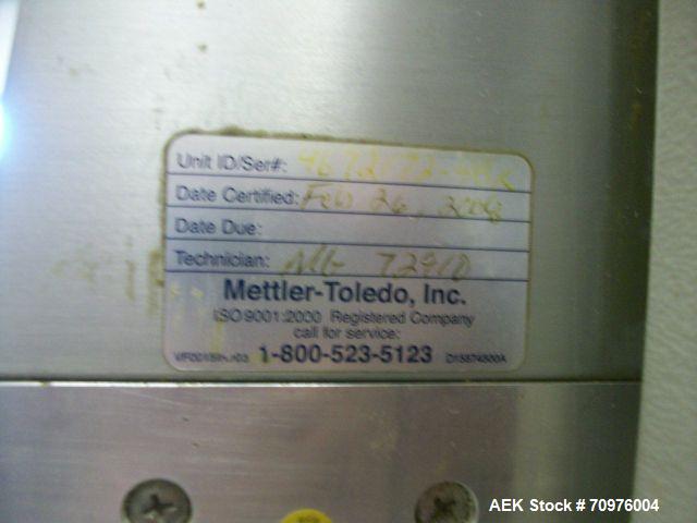 Used Mettler Toledo Wrapper, Model 645 XL-45, 90 degree conveyor, 3' accumulator table.