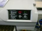 Used Mettler Toledo Wrapper, Model 645 XL-45, 90 degree conveyor, 3' accumulator table.