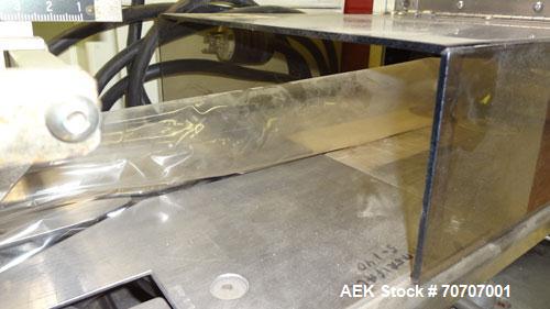Used Ameripak Model 140S Horizontal Wrapper capable of speeds up to 100 feet per minute. Printed Film Registered Wrapper is convertible with modular fin seal assemblies for either shrink or supported...