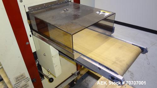Used Ameripak Model 140S Horizontal Wrapper capable of speeds up to 100 feet per minute. Printed Film Registered Wrapper is convertible with modular fin seal assemblies for either shrink or supported...