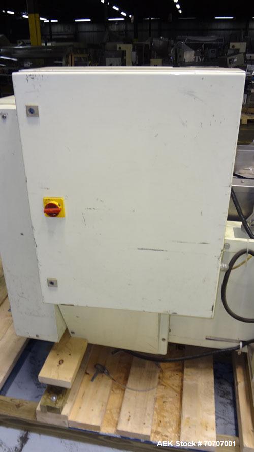 Used Ameripak Model 140S Horizontal Wrapper capable of speeds up to 100 feet per minute. Printed Film Registered Wrapper is convertible with modular fin seal assemblies for either shrink or supported...