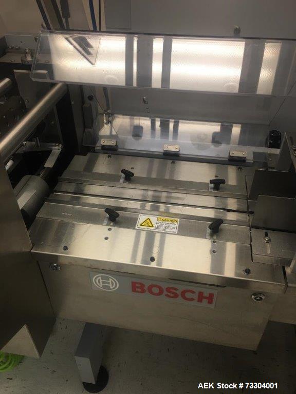 Used Bosch Horizontal Flow Wrapper, Model Pack 201. Machine is rated for speeds up to 450 packages per minute (depending on package size and changeparts). Has a size range of: 40 mm (1.5") to 565 mm ...
