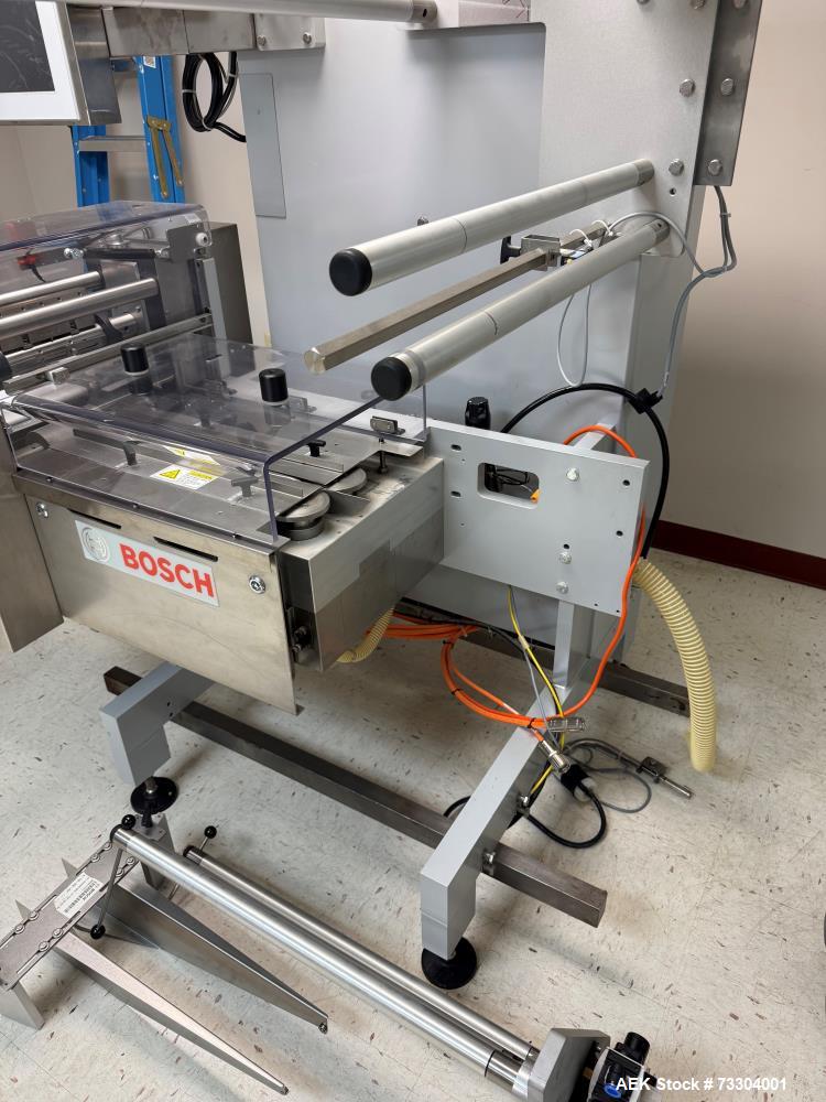 Used Bosch Horizontal Flow Wrapper, Model Pack 201. Machine is rated for speeds up to 450 packages per minute (depending on package size and changeparts). Has a size range of: 40 mm (1.5") to 565 mm ...