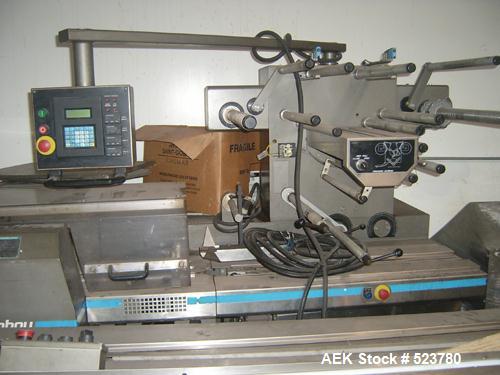 USED: Doboy Aurora wrapper, manufactured early 1998, 70-80m. Aurora was a limited production model, produced for use between J Wrapper and Supermustang. It includes the wrapper, 30 foot infeed convey...