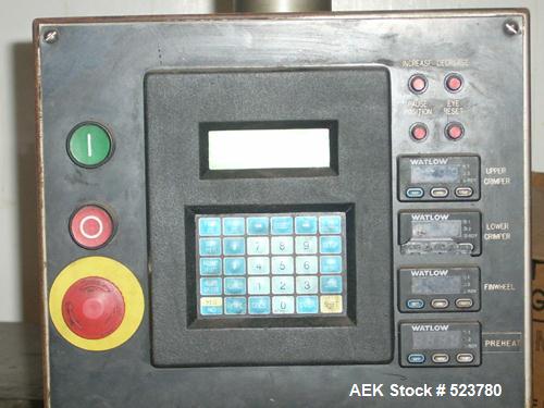 USED: Doboy Aurora wrapper, manufactured early 1998, 70-80m. Aurora was a limited production model, produced for use between J Wrapper and Supermustang. It includes the wrapper, 30 foot infeed convey...
