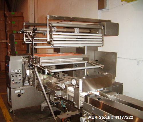 Used Doboy Horizontal Wrapper, Model J. Capable of speeds over 200 packages per minute. Has extended height seal, side belt product infeed belts, film registration, 1 up sealing head 8" wide and has ...