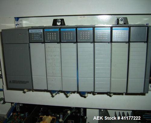 Used Doboy Horizontal Wrapper, Model J. Capable of speeds over 200 packages per minute. Has extended height seal, side belt product infeed belts, film registration, 1 up sealing head 8" wide and has ...