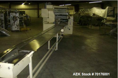Used Doboy Model J Horizontal Wrapper capable of speeds over 200 packages per minute. Film registration, 1 up sealing head 12" with seal jaws, 10' long lugged chain infeed on 11-1/2" centers. Has pri...