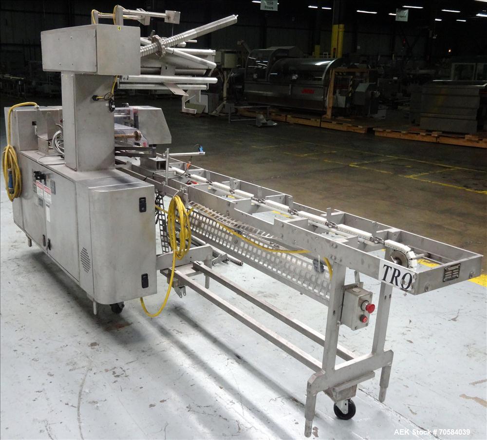 Used Bosch (Doboy) Linium 311 horizontal wrapper. Parts Machine Only.  1 up crimper capable of speeds up to 150 packages per minute (can run up to 350 packages per minute on a 2 up configuration). Ha...