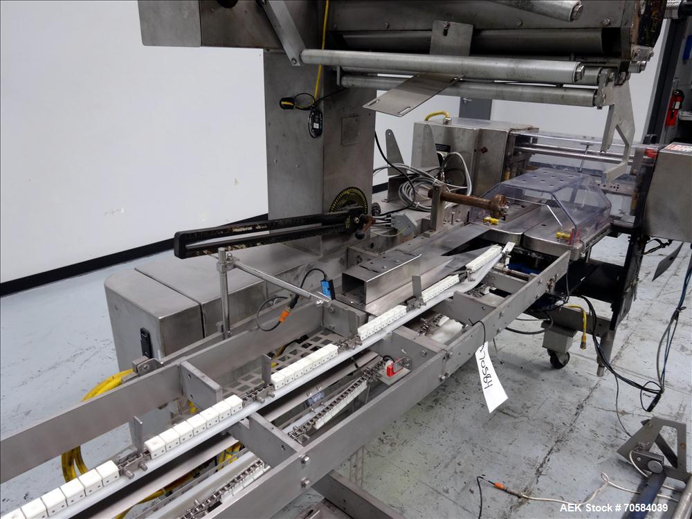 Used Bosch (Doboy) Linium 311 horizontal wrapper. Parts Machine Only.  1 up crimper capable of speeds up to 150 packages per minute (can run up to 350 packages per minute on a 2 up configuration). Ha...