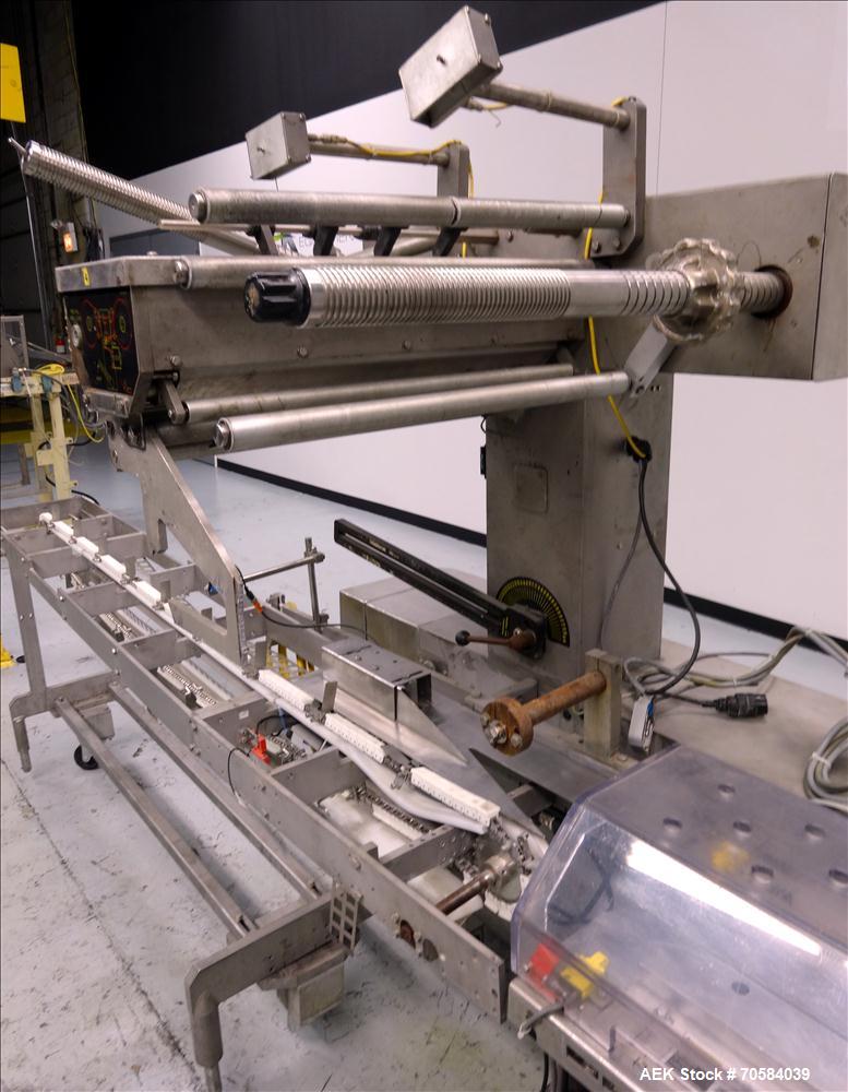 Used Bosch (Doboy) Linium 311 horizontal wrapper. Parts Machine Only.  1 up crimper capable of speeds up to 150 packages per minute (can run up to 350 packages per minute on a 2 up configuration). Ha...