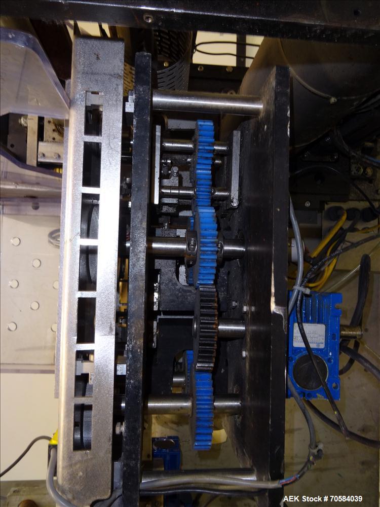 Used Bosch (Doboy) Linium 311 horizontal wrapper. Parts Machine Only.  1 up crimper capable of speeds up to 150 packages per minute (can run up to 350 packages per minute on a 2 up configuration). Ha...