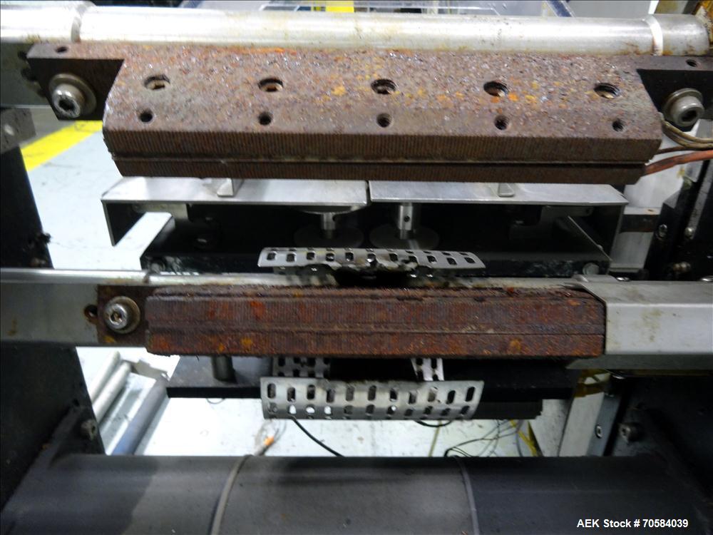 Used Bosch (Doboy) Linium 311 horizontal wrapper. Parts Machine Only.  1 up crimper capable of speeds up to 150 packages per minute (can run up to 350 packages per minute on a 2 up configuration). Ha...