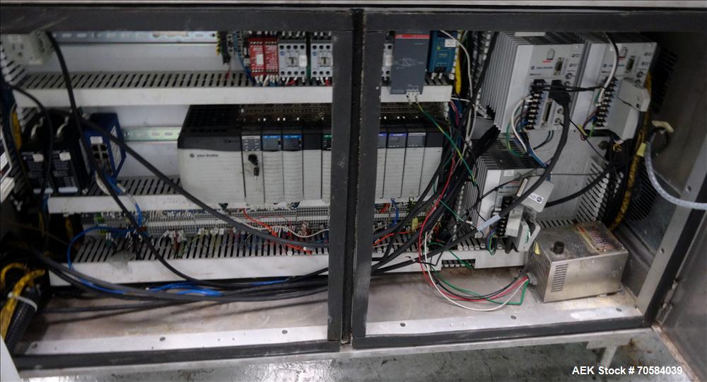Used Bosch (Doboy) Linium 311 horizontal wrapper. Parts Machine Only.  1 up crimper capable of speeds up to 150 packages per minute (can run up to 350 packages per minute on a 2 up configuration). Ha...