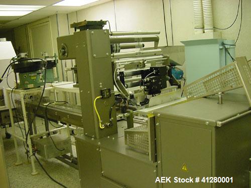 Used Doboy Mustang IV Horizontal Wrapper capable of speeds up to 150 cpm. 2 up unit with Markem 9820 hot stamp coder. Package size range up to 6-1/2" wide x 2" high. Has 7-1/2" wide crimp seal jaws. ...