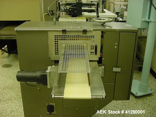 Used Doboy Mustang IV Horizontal Wrapper capable of speeds up to 150 cpm. 2 up unit with Markem 9820 hot stamp coder. Package size range up to 6-1/2" wide x 2" high. Has 7-1/2" wide crimp seal jaws. ...
