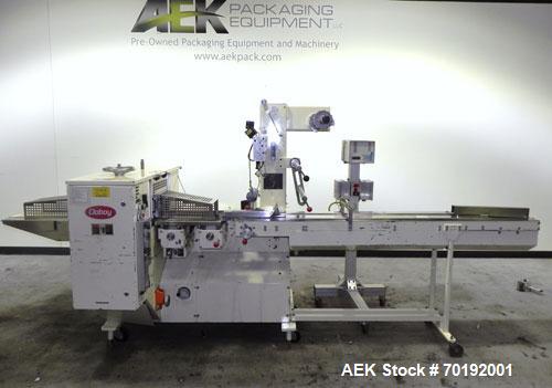 Used Doboy Mustang IV Horizontal Wrapper. Machine is capable of speeds up to 90 cpm. The Doboy is a 1 up unit with film registration and an Argus bar code scanner. Package size range: length up to 15...