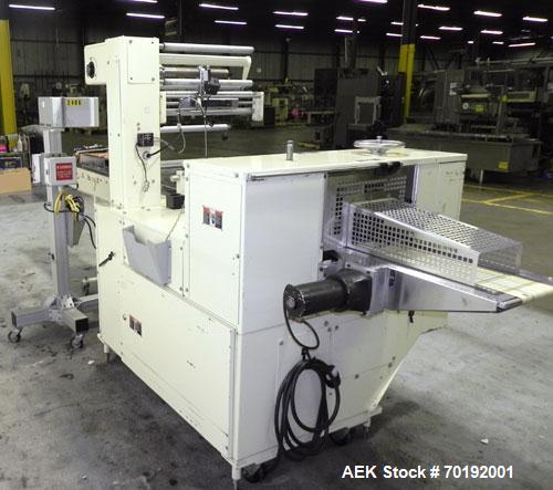 Used Doboy Mustang IV Horizontal Wrapper. Machine is capable of speeds up to 90 cpm. The Doboy is a 1 up unit with film registration and an Argus bar code scanner. Package size range: length up to 15...
