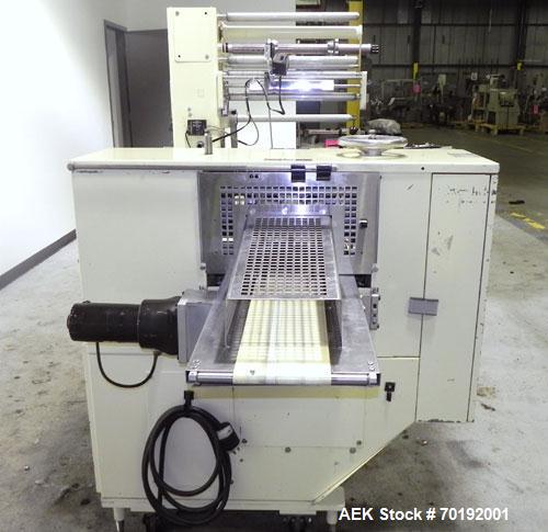 Used Doboy Mustang IV Horizontal Wrapper. Machine is capable of speeds up to 90 cpm. The Doboy is a 1 up unit with film registration and an Argus bar code scanner. Package size range: length up to 15...