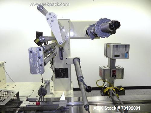 Used Doboy Mustang IV Horizontal Wrapper. Machine is capable of speeds up to 90 cpm. The Doboy is a 1 up unit with film registration and an Argus bar code scanner. Package size range: length up to 15...