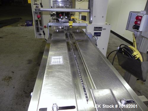 Used Doboy Mustang IV Horizontal Wrapper. Machine is capable of speeds up to 90 cpm. The Doboy is a 1 up unit with film registration and an Argus bar code scanner. Package size range: length up to 15...
