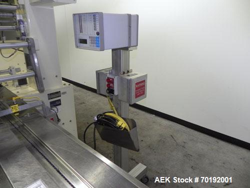 Used Doboy Mustang IV Horizontal Wrapper. Machine is capable of speeds up to 90 cpm. The Doboy is a 1 up unit with film registration and an Argus bar code scanner. Package size range: length up to 15...